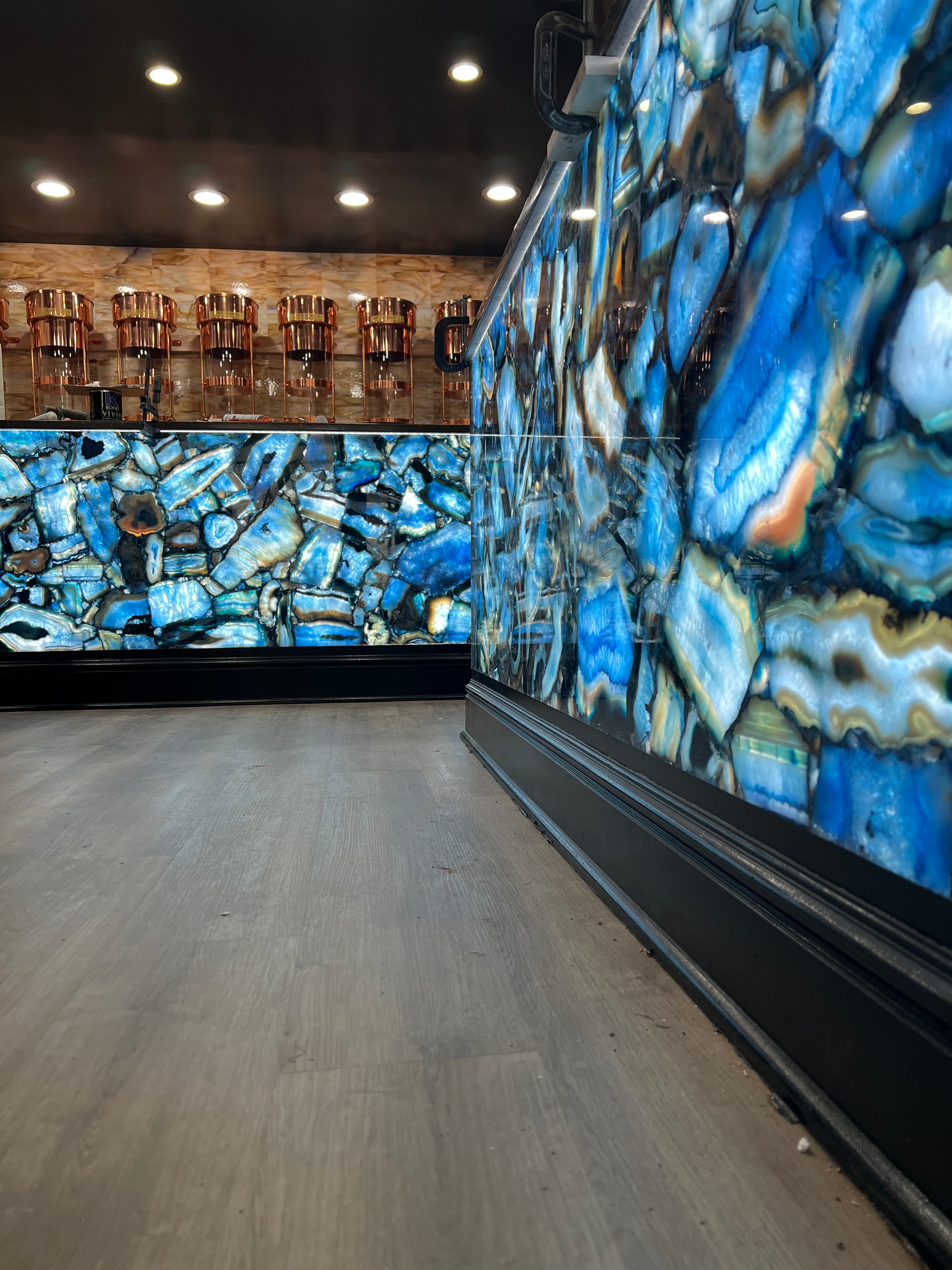 Completed backlit geode ceiling installation with ambient LED lighting