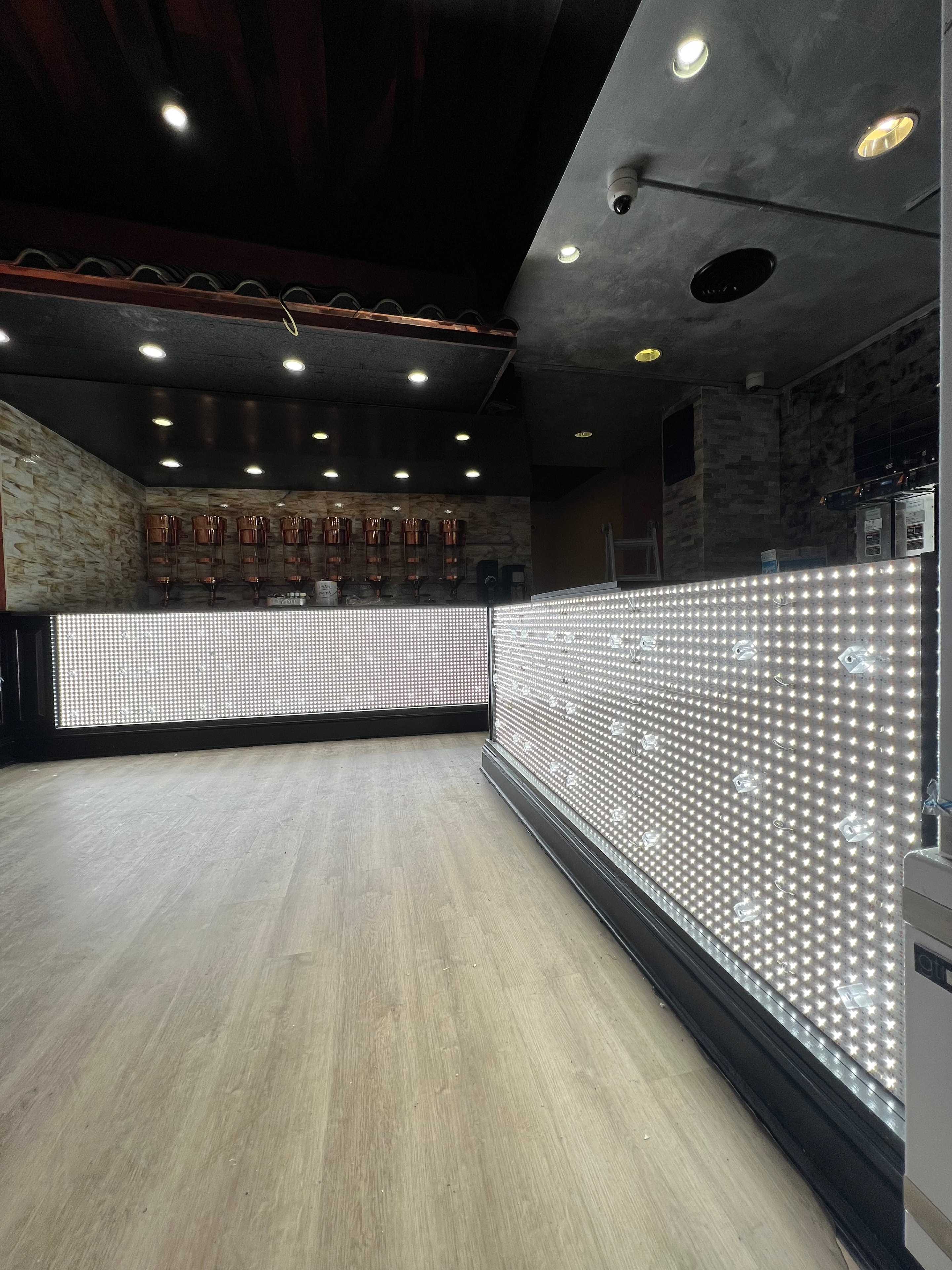 LED matrix ceiling panel installation during construction phase