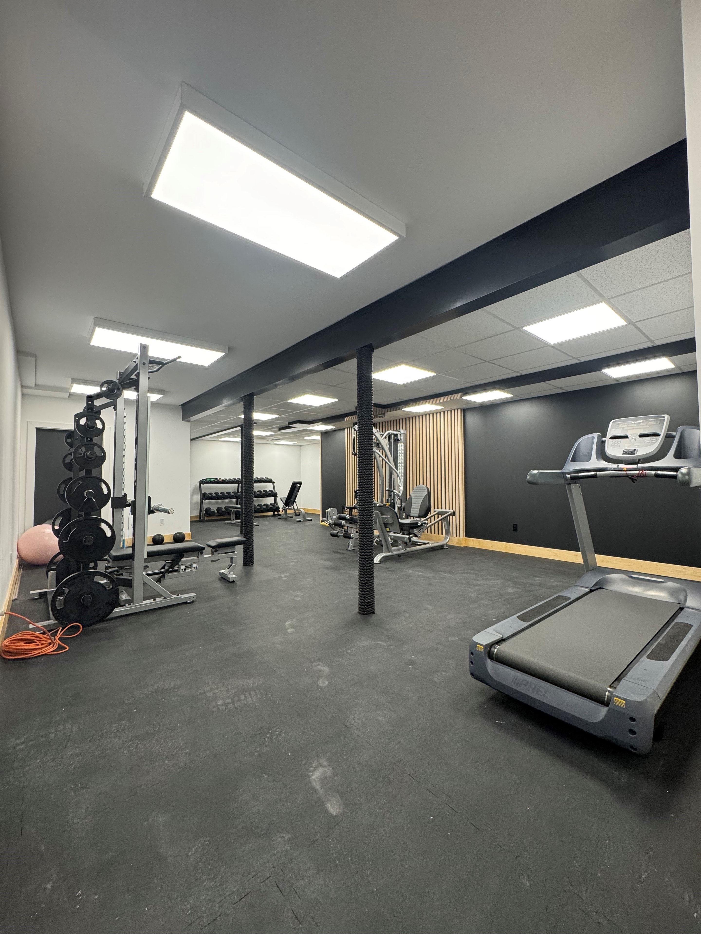 LED panel lighting installation for a full commercial fitness facility